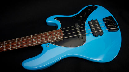 Sandberg California II / TM / Blacklabel PUs / 4-String 34" / Highgloss Marley Blue / Alder Body / Pau Ferro FB / Varied Dot Inlays / Black Head Stock / Black Hardware / Active 2-EQ / Split Switch / Black Pickguard - 8.4 pounds SN 50009
